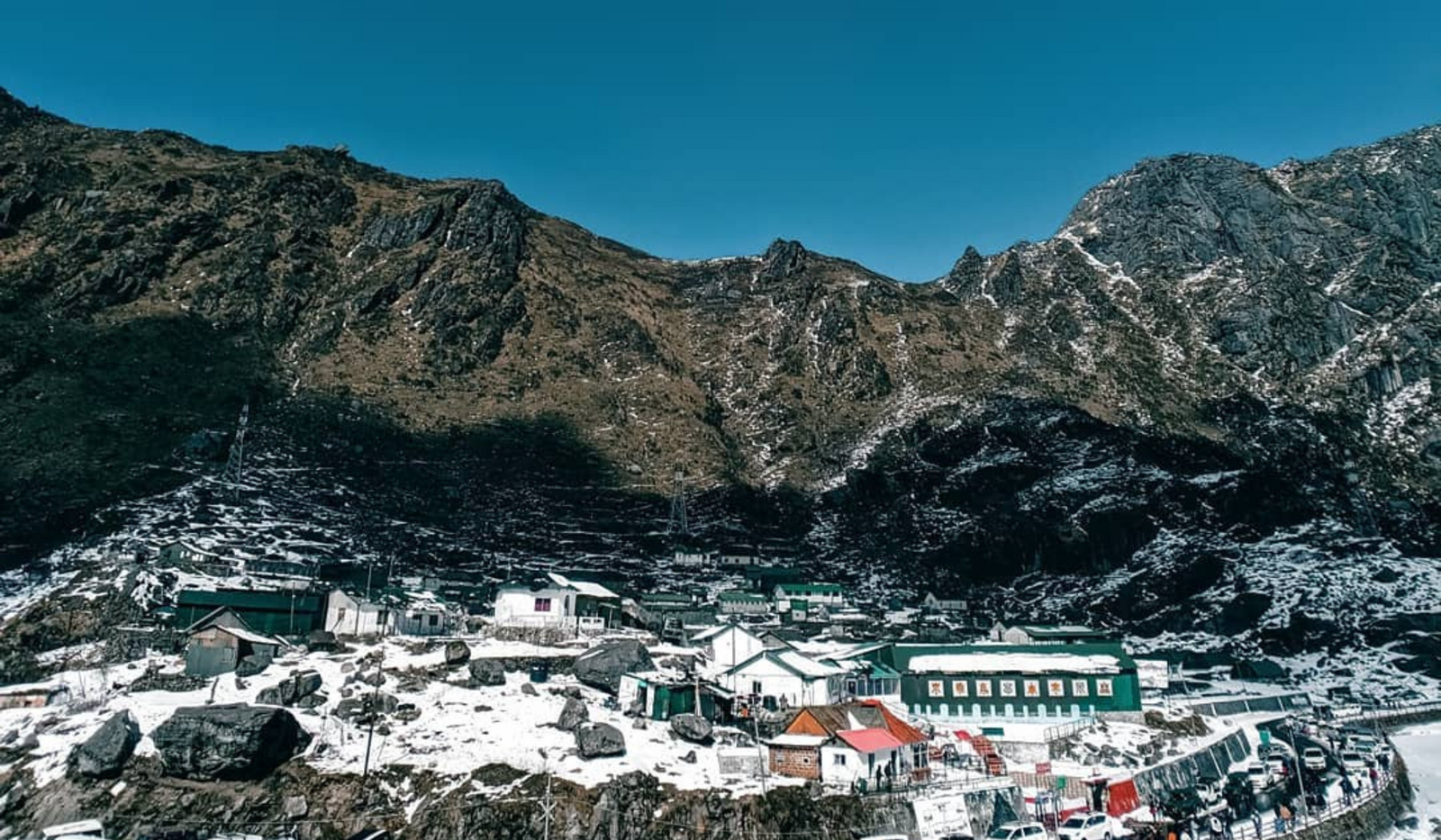 Why is the wide-angle lens a popular choice for landscape photographers?